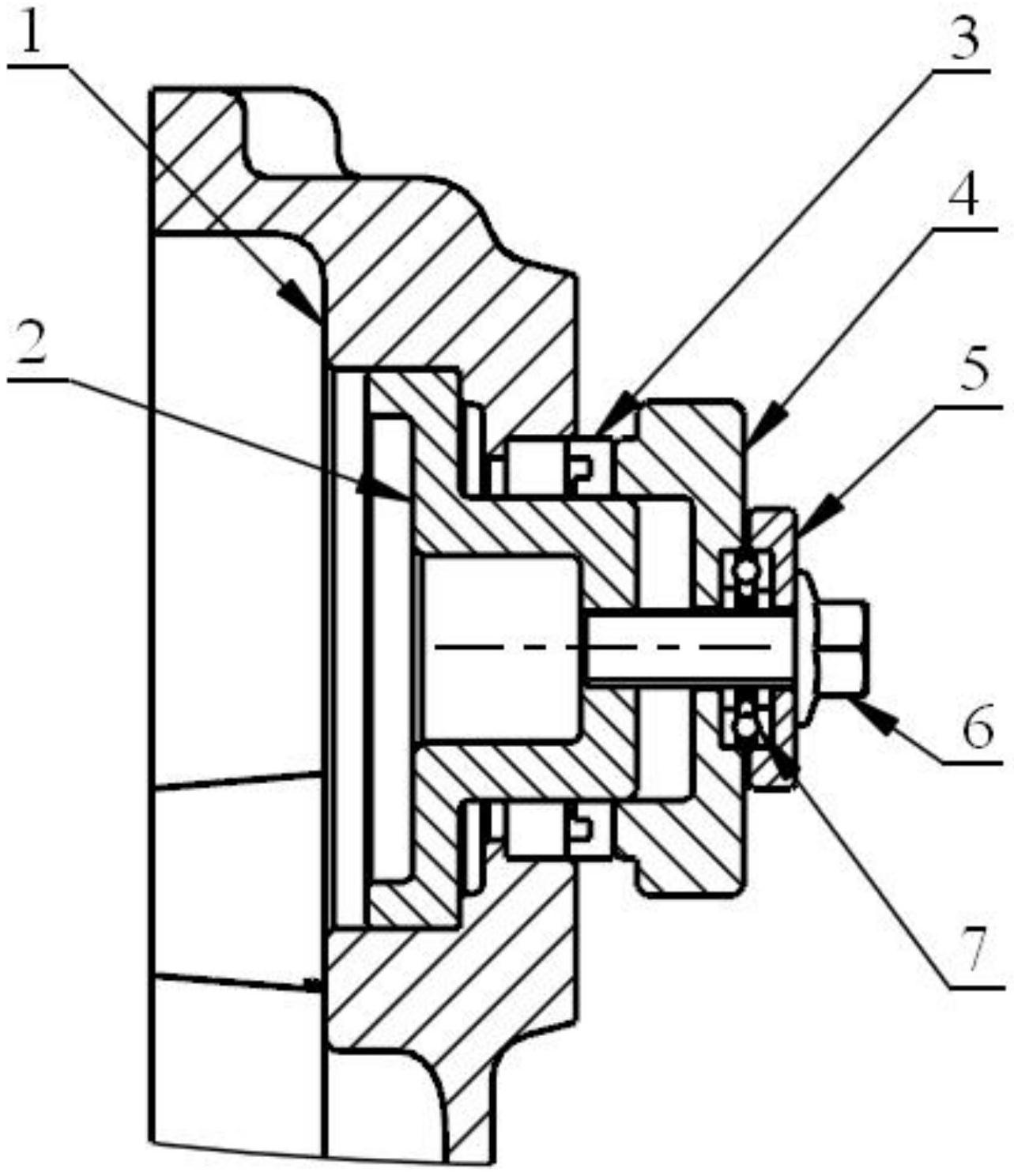 定位轴内开有螺纹孔,所述定位轴上由内至外依次同轴装配有骨架油封和